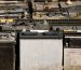 A pallet holds several batteries awaiting recycling at a metal recycling scrap yard